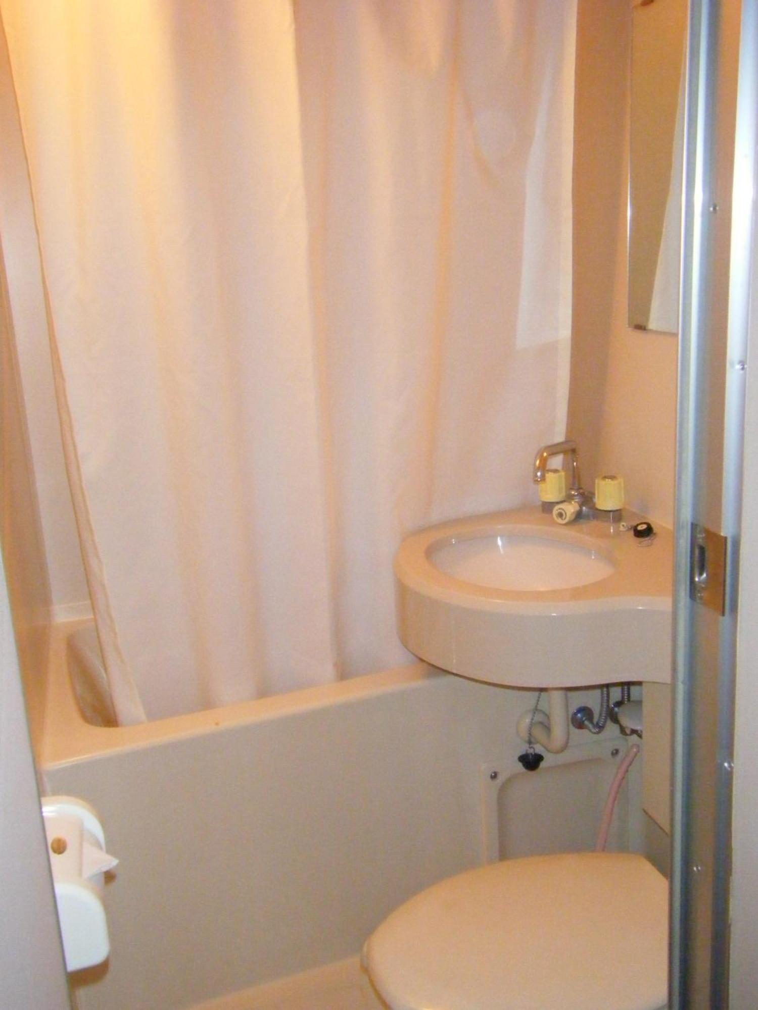 Sunplaza Rinkai Hotel Osaka Bagian luar foto